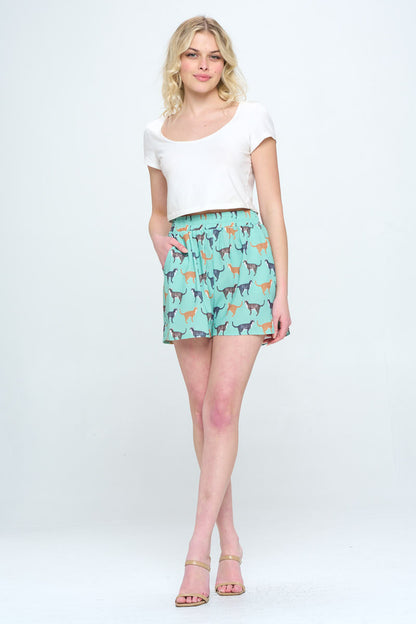ALL OVER CAT PRINT GREEN SHORTS WITH POCKETS