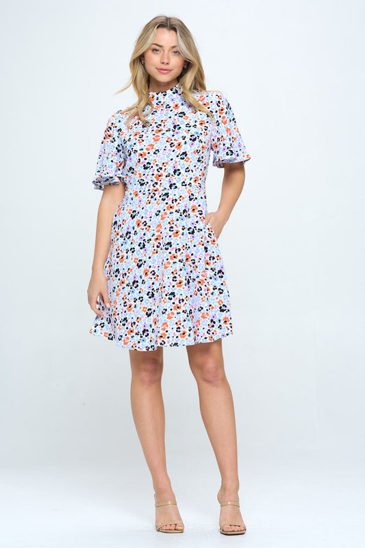 ALL OVER FLORAL PRINT FLUTTER SLEEVE DRESS WITH POCKETS